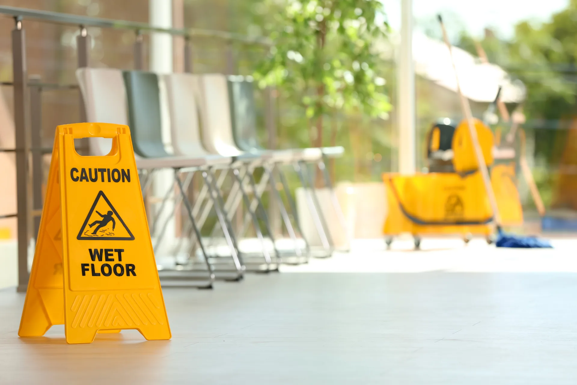 Wet floor caution sign placed during commercial cleaning